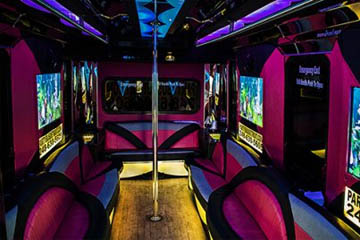 flat screen tvs on a limo bus