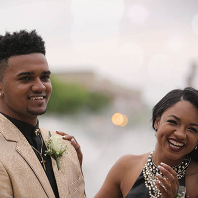 teens smiling on their prom day